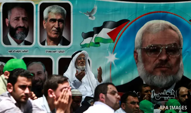 Palestinian Prime Minister in Gaza Ismail Haniyeh (not seen) during the friday prayers at a sit-in tent held by Palestinian released prisoners, solidarity with Palestinian prisoners held in Israeli jails, in Gaza City on...