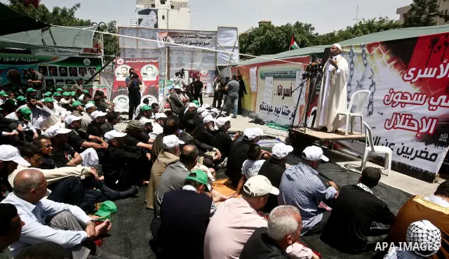 Palestinian Prime Minister in Gaza Ismail Haniyeh during the friday prayers at a sit-in tent held by Palestinian released prisoners, solidarity with Palestinian prisoners held in Israeli jails, in Gaza City on May 04, 20...