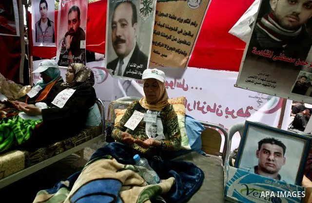 Palestinians participat at hunger striking during a sit-in tent held by Palestinian released prisoners, solidarity with Palestinian prisoners held in Israeli jails, in Gaza City on May 04, 2012. Photo by Ali Jadallah