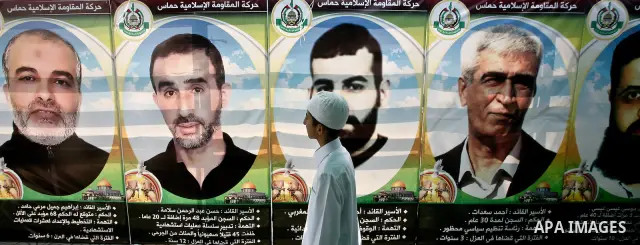 A Palestinian child participats at hunger striking during a sit-in tent held by Palestinian released prisoners, solidarity with Palestinian prisoners held in Israeli jails, in Gaza City on May 04, 2012. Photo by Ali Jada...