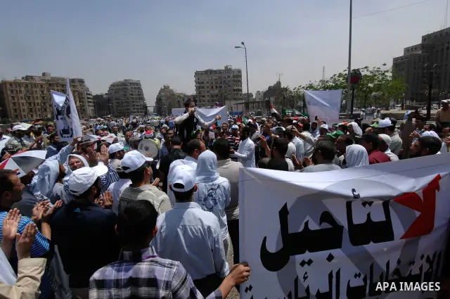 May 4, 2012 - Cairo, Egypt - Egyptians protest during the 'Final Friday' march against Military Rule in Tahrir Square on May 4, 2012. The 'Final Friday' protests were called after a week of street battles near the Minist...