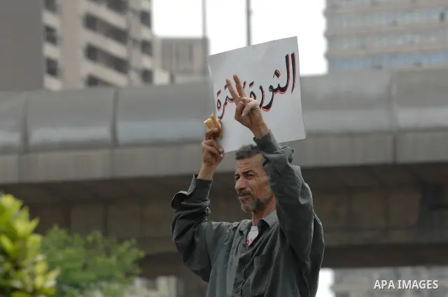 May 4, 2012 - Cairo, Egypt - Egyptians protest during the 'Final Friday' march against Military Rule in the Abasseya neighborhood of Cairo on May 4, 2012. The 'Final Friday' protests were called after a week of street ba...
