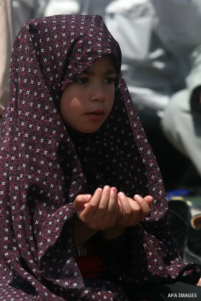 Palestinians perform Friday prayers during protest, in Ramallah, West Bank, May 04, 2012. An estimated 2,000 Palestinians held in prayer outside a tent in solidarity with prisoners who have been waging a hunger strike in...