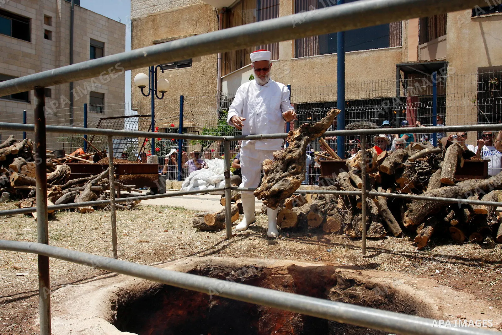 Members of the Samaritan sect prepare a traditional oven with mud during the traditional Passover sacrifice in Mount Gerizim, in the northern West Bank city of Nablus, 04 May 2012. According to tradition, the Samaritans...