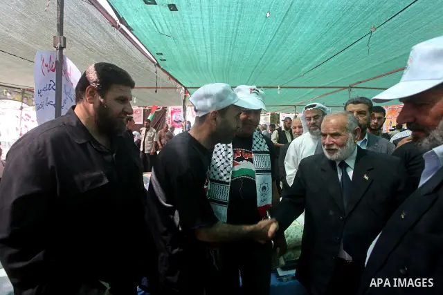 The spokesman of Hamas Parliament, Ahmed Bahar, take parts a protest during a rally to show solidarity with prisoners held in Israeli jails, in Gaza City May 6, 2012. A hunger strike by Palestinian prisoners against Isra...