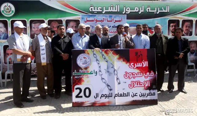 A Palestinian Officer, delivers speech during a press conference. a rally to show solidarity with prisoners held in Israeli jails, in Gaza City May 6, 2012. A hunger strike by Palestinian prisoners against Israel's jail...