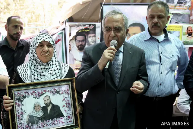 Palestinian Prime Minister Salam Fayyad during a support campaign for Palestinian prisoners on hunger strike Israeli jails, in the West Bank town of Nablus, Sunday , May 6, 2012 . Photo by Wagdi Eshtayah