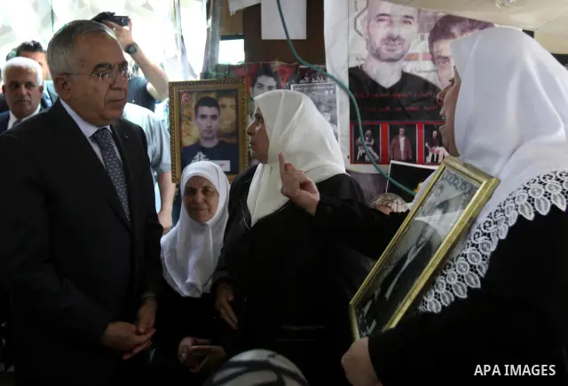 Palestinian Prime Minister Salam Fayyad during a support campaign for Palestinian prisoners on hunger strike Israeli jails, in the West Bank town of Nablus, Sunday , May 6, 2012 . Photo by Wagdi Eshtayah