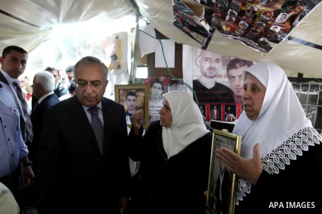 Palestinian Prime Minister Salam Fayyad during a support campaign for Palestinian prisoners on hunger strike Israeli jails, in the West Bank town of Nablus, Sunday , May 6, 2012 . Photo by Wagdi Eshtayah