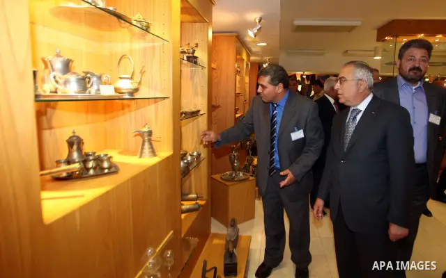 Palestinian Prime Minister, Salam Fayyad, attends opening of the exhibition of Fine Arts at An-Najah University National, in the West Bank town of Nablus, May 6, 2012. Photo by Mustafa Abu Dayeh