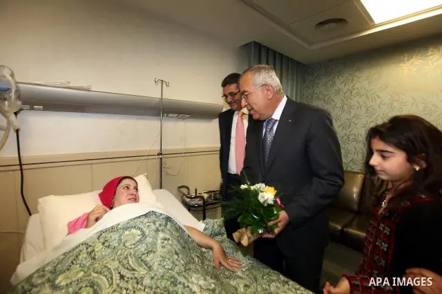 Palestinian Prime Minister, Salam Fayyad,attends opening of the maternity department in the Arab hospital specialist, in the West Bank town of Nablus, May 6, 2012. Photo by Mustafa Abu Dayeh