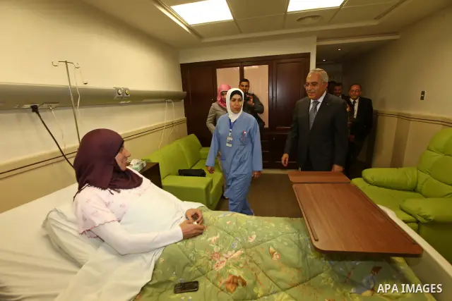 Palestinian Prime Minister, Salam Fayyad,attends opening of the maternity department in the Arab hospital specialist, in the West Bank town of Nablus, May 6, 2012. Photo by Mustafa Abu Dayeh