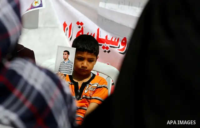 Palestinian women attend a rally in Gaza City, to show solidarity with Palestinian prisoners held in Israeli jails on May 7, 2012. At least 1,550 Palestinian prisoners are refusing food in Israeli jails in a protest agai...