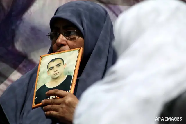Palestinian women attend a rally in Gaza City, to show solidarity with Palestinian prisoners held in Israeli jails on May 7, 2012. At least 1,550 Palestinian prisoners are refusing food in Israeli jails in a protest agai...
