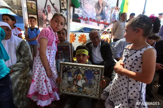Palestinian Prime Minister, Salam Fayyad, attends a rally in the West Bank town of Tubas, to show solidarity with Palestinian prisoners held in Israeli jails on May 7, 2012. At least 1,550 Palestinian prisoners are refus...