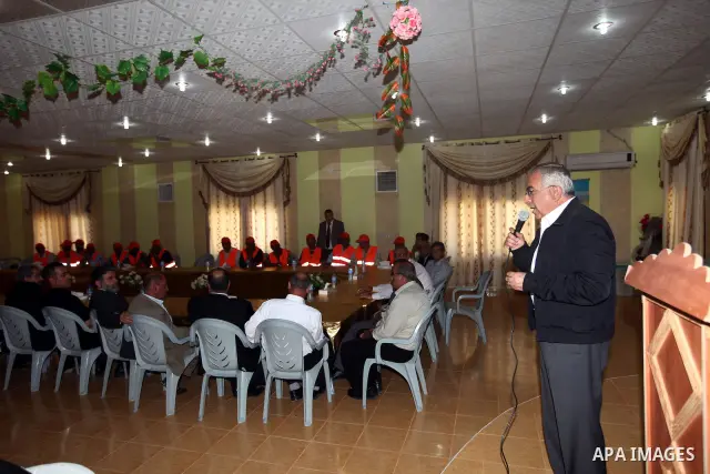 Palestinian Prime Minister, Salam Fayyad, meet with the cleaners in the Tubas portfolio in honor of "International Workers' Day", in the West Bank town of Tubas, May 7, 2012. Photo by Mustafa Abu Dayeh