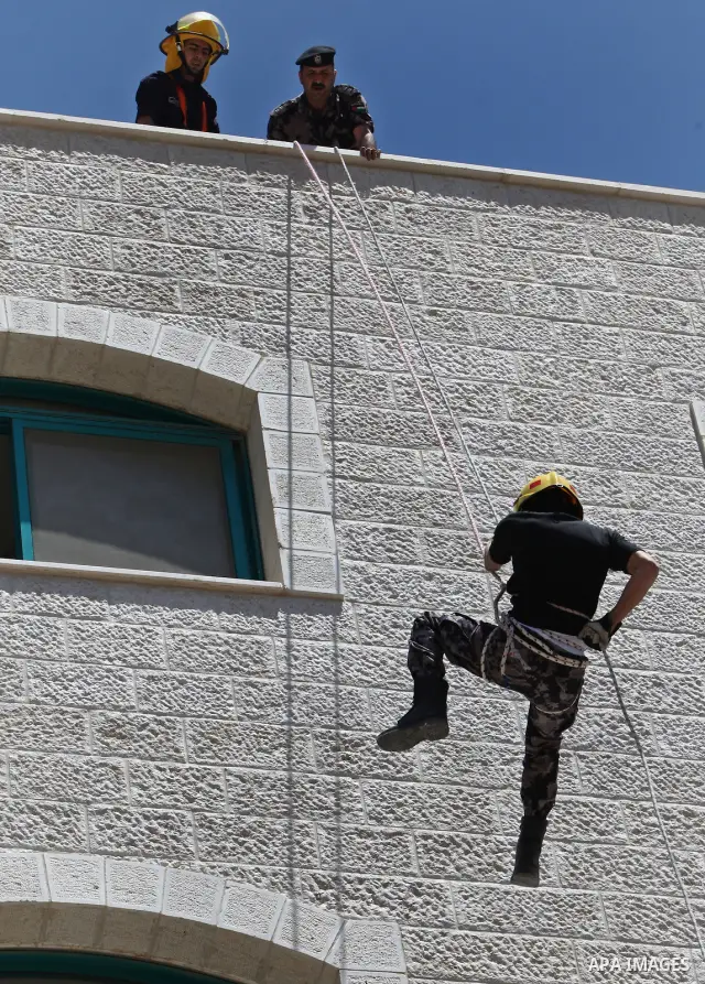 Palestinian Prime Minister, Salam Fayyad, (not seen) attends during a training session following the campaign "your Safety", in the West Bank City of Tubas, on May 07, 2012. Photo by Mustafa Abu Dayeh
