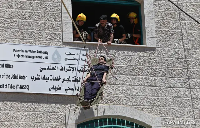 Palestinian Prime Minister, Salam Fayyad, (not seen) attends during a training session following the campaign "your Safety", in the West Bank City of Tubas, on May 07, 2012. Photo by Mustafa Abu Dayeh