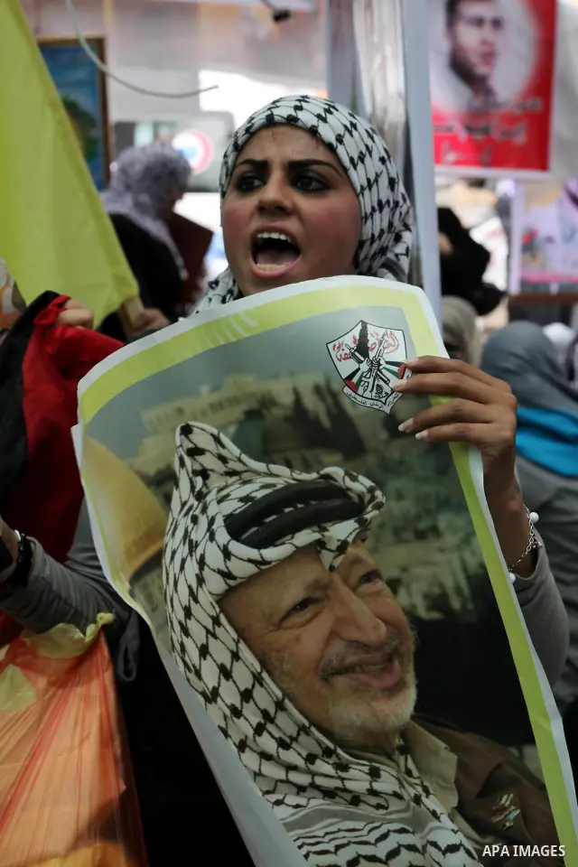 Palestinian woman shouts slogans aduring a demonstration in Gaza City on May 8, 2012 in solidarity with the prisoners. At least 1,550 imprisoned Palestinians are now taking part in a mass hunger strike. Photo by Ashraf A...