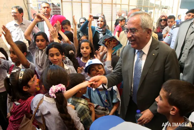 Palestinian Prime Minister Salam Fayyad, participates in a ceremony of the celebration "Europe Day", in the West Bank city of Ramallah, on May 09, 2012. Photo by Mustafa Abu Dayeh