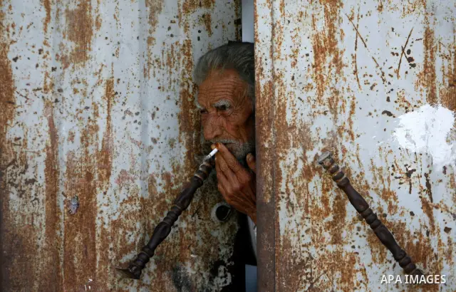 A Palestinian man at his house in the Rafah refugee camp in the southern area of the Gaza Strip on May 09 2012. On May 15 Palestinians will mark "Nakba," or catastrophe, of Israel's founding in a 1948 war, when hundreds...