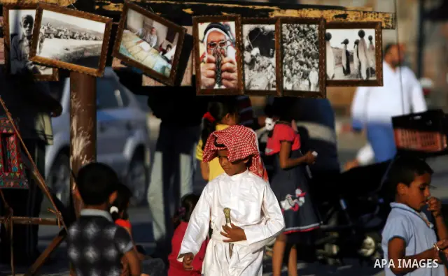 Palestinian children are seen during a Hamas rally ahead of Nakba, in Rafah refugee camp, Gaza City, 11 May 2012. Palestinians mark the 64rd anniversary of 'Nakba', or catastrophe, in reference to the creation of the sta...