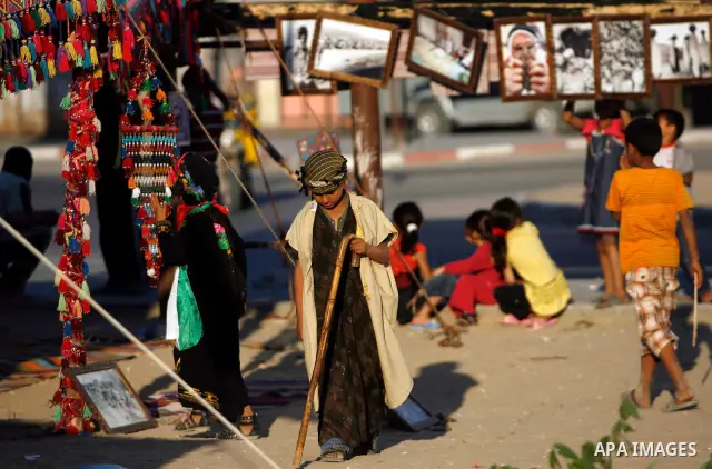 Palestinian children are seen during a Hamas rally ahead of Nakba, in Rafah refugee camp, Gaza City, 11 May 2012. Palestinians mark the 64rd anniversary of 'Nakba', or catastrophe, in reference to the creation of the sta...
