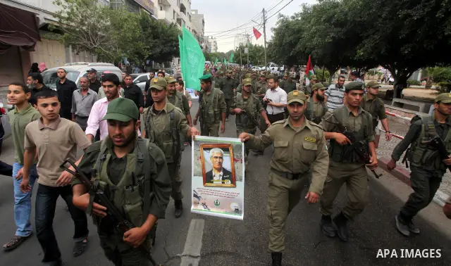 Palestinian Hamas police officers take part in a rally to show solidarity with prisoners held in Israeli jails, in Gaza City May 14, 2012. One in three of the 4,800 Palestinians serving time in Israeli jails began refusi...