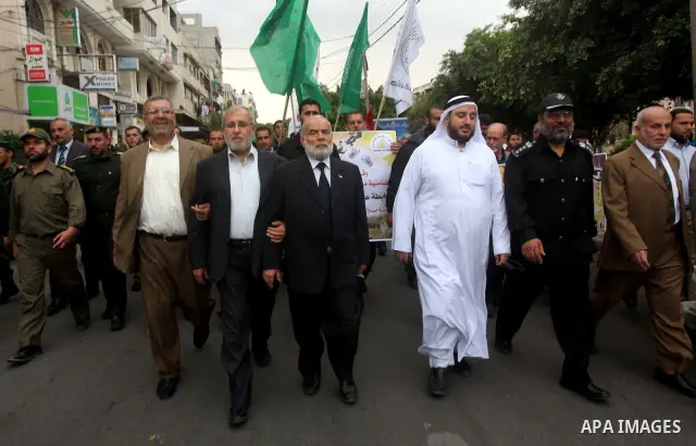 Palestinian Hamas police officers take part in a rally to show solidarity with prisoners held in Israeli jails, in Gaza City May 14, 2012. One in three of the 4,800 Palestinians serving time in Israeli jails began refusi...