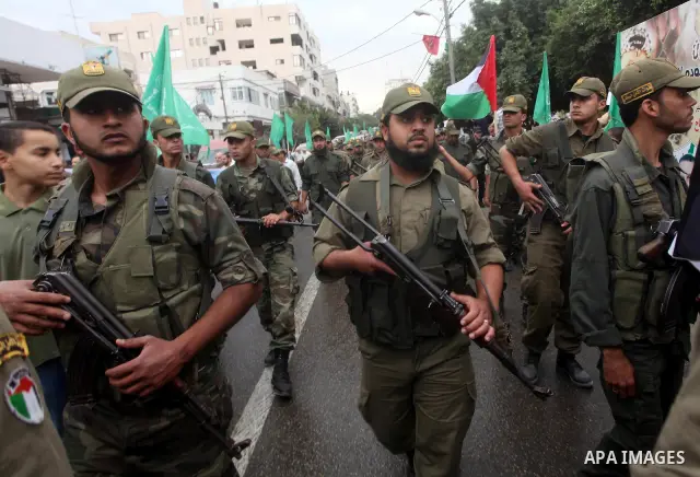 Palestinian Hamas police officers take part in a rally to show solidarity with prisoners held in Israeli jails, in Gaza City May 14, 2012. One in three of the 4,800 Palestinians serving time in Israeli jails began refusi...
