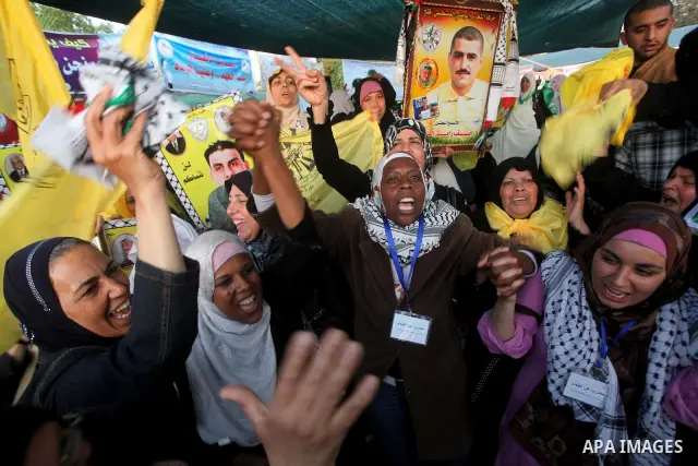 Relatives of Palestinian prisoners held in Israeli jails celebrate after the signing of a deal to end the prisoners hunger strike in Gaza City on 14 May 2012. Israel and Palestinian signed an agreement 14 May ending a ma...