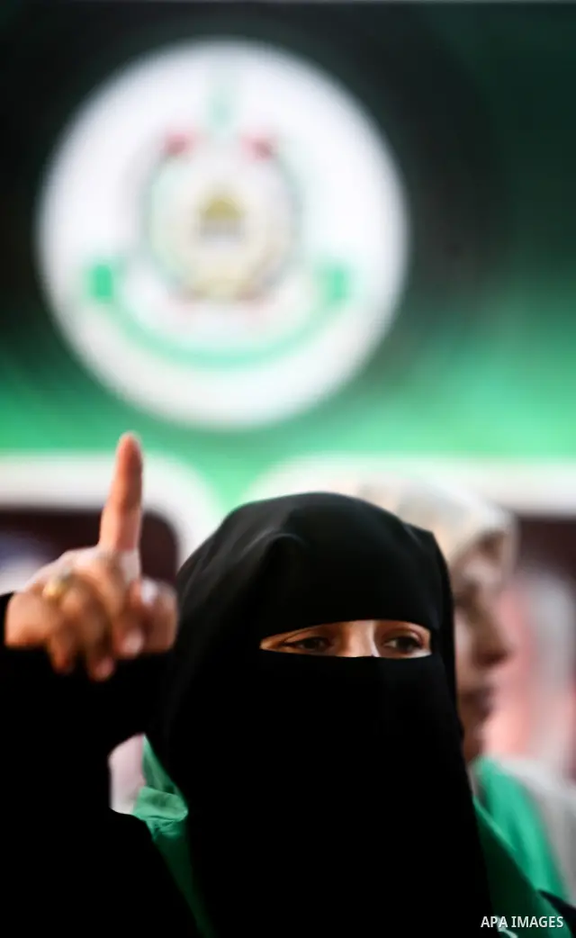 Relatives of Palestinian prisoners held in Israeli jails celebrate after the signing of a deal to end the prisoners hunger strike in Gaza City on 14 May 2012. Israel and Palestinian signed an agreement 14 May ending a ma...