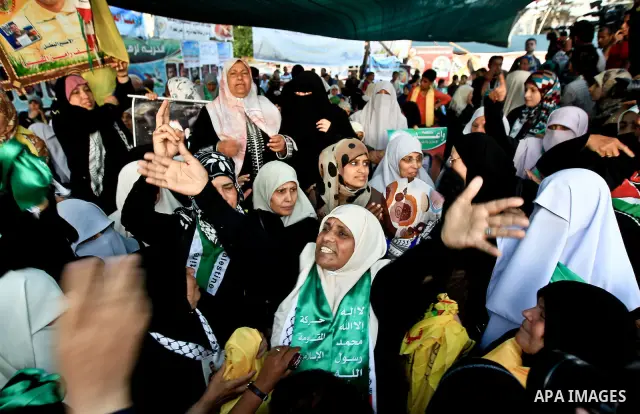 Relatives of Palestinian prisoners held in Israeli jails celebrate after the signing of a deal to end the prisoners hunger strike in Gaza City on 14 May 2012. Israel and Palestinian signed an agreement 14 May ending a ma...