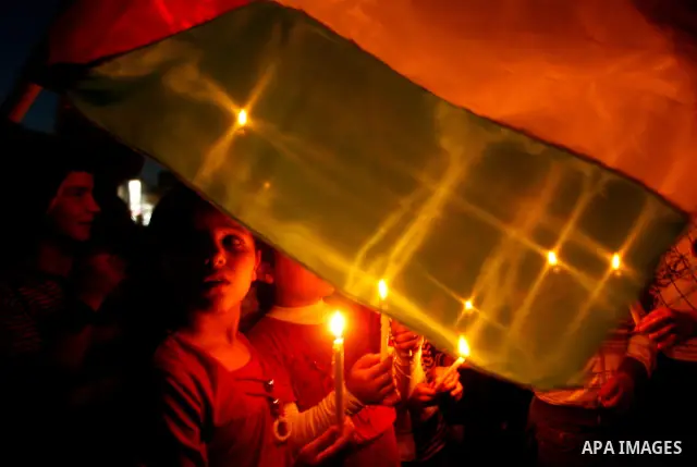 Palestinian children hold candles during a rally in Khan Younis in the southern Gaza Strip, ahead of Nakba May 14, 2012. On May 15 Palestinians will mark Nakba, or catastrophe, of Israel's founding in a 1948 war, when hu...