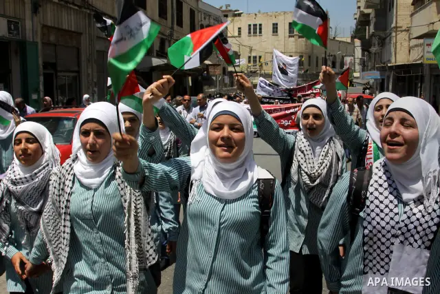 Palestinians take part in a demonstration to mark the 64th anniversary of "Nakba" (catastrophe), in the West Bank city of Nablus, on May 15, 2012. 'Nakba' Day for the Palestinians is an annual day of commemoration of the...