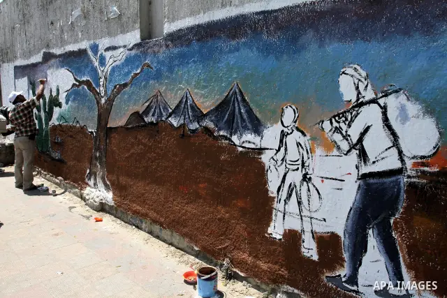 Palestinian artists paint murals marking Nakba in Gaza City May 15, 2012. Palestinians mark Nakba, or catastrophe, of Israel's founding in a 1948 war, when hundreds of thousands of their brethren fled or were forced to l...