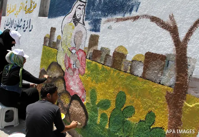 Palestinian artists paint murals marking Nakba in Gaza City May 15, 2012. Palestinians mark Nakba, or catastrophe, of Israel's founding in a 1948 war, when hundreds of thousands of their brethren fled or were forced to l...
