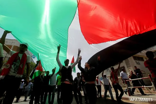 Palestinians participate in a rally marking Al-Nakba, commemorating the displacement of Palestinians in 1948 due to the declaration of the state of Israel, in Gaza City, Gaza Strip, 15 May 2012. Thousands marched in the...