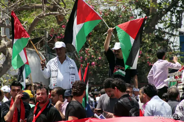 Palestinians participate in a rally marking Al-Nakba, commemorating the displacement of Palestinians in 1948 due to the declaration of the state of Israel, in Gaza City, Gaza Strip, 15 May 2012. Thousands marched in the...