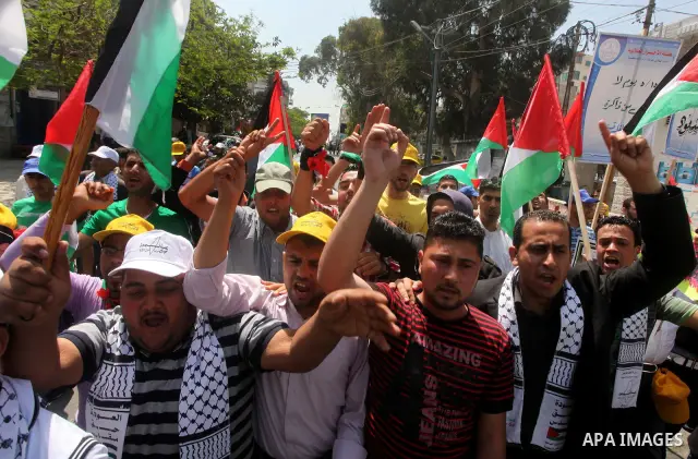Palestinians participate in a rally marking Al-Nakba, commemorating the displacement of Palestinians in 1948 due to the declaration of the state of Israel, in Gaza City, Gaza Strip, 15 May 2012. Thousands marched in the...