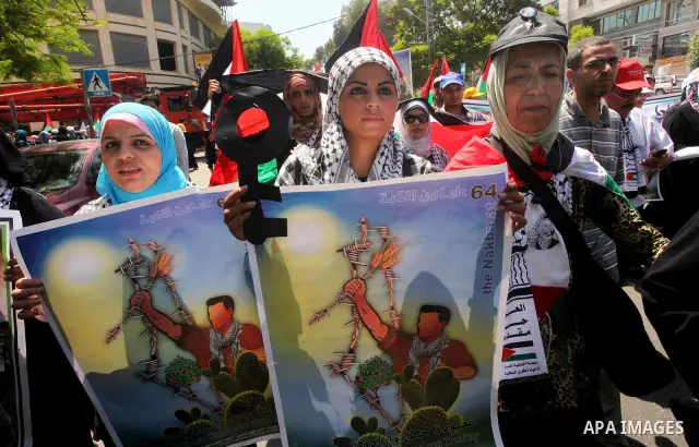 Palestinians participate in a rally marking Al-Nakba, commemorating the displacement of Palestinians in 1948 due to the declaration of the state of Israel, in Gaza City, Gaza Strip, 15 May 2012. Thousands marched in the...