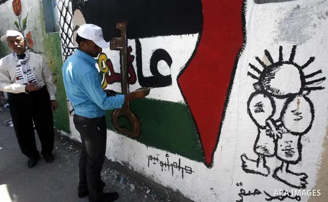 Palestinian artists paint murals marking Nakba in Gaza City May 15, 2012. Palestinians mark Nakba, or catastrophe, of Israel's founding in a 1948 war, when hundreds of thousands of their brethren fled or were forced to l...