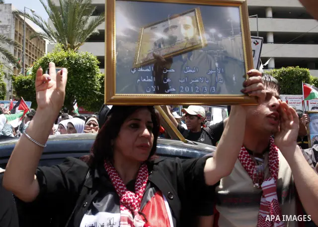 Palestinian women shout slogans against Israel during a rally marking the 64th anniversary of the 'Nakba' ('catastrophe') in Nablus, the West Bank, 15 May 2012. Thousands marched in the West Bank and Gaza Strip, commemor...