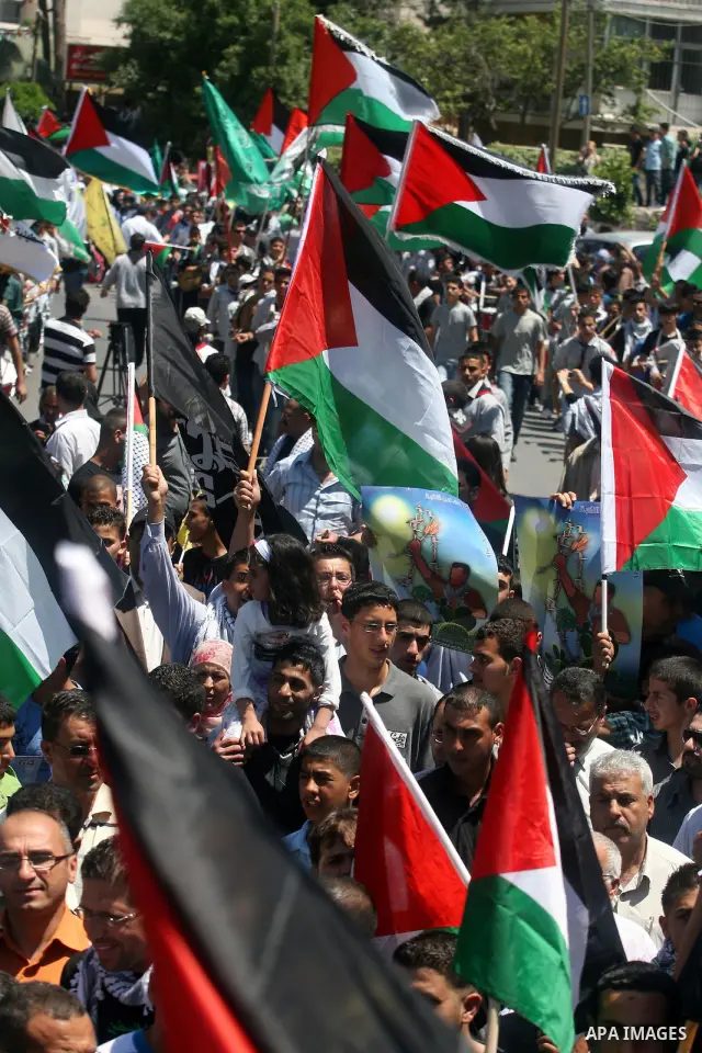 Palestinians attend a rally marking Al-Nakba Day in the West Bank city of Ramallah, on May 15, 2012. The Palestinians continued to rally in the West Bank and the Gaza Strip to mark al- Nakba Day when thousands of Palesti...