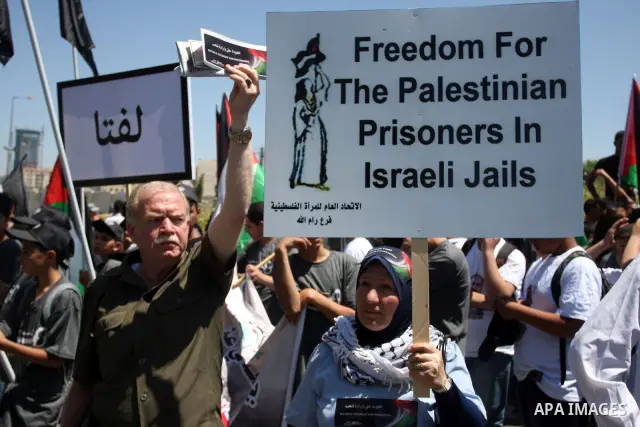 Palestinians attend a rally marking Al-Nakba Day in the West Bank city of Ramallah, on May 15, 2012. The Palestinians continued to rally in the West Bank and the Gaza Strip to mark al- Nakba Day when thousands of Palesti...