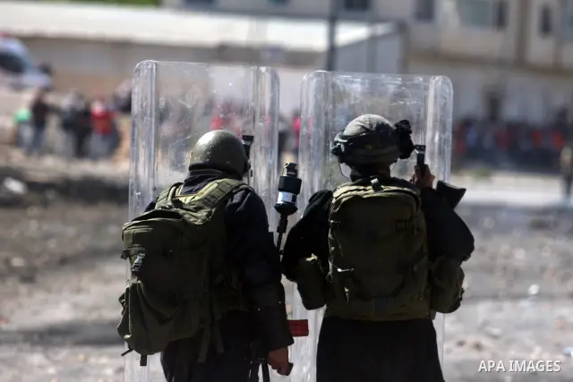 Israeli border police fires tear gas towards Palestinian protesters, during clashes on Nakba Day near Ofer prison, near Ramallah, the West Bank, 15 May 2012. Thousands marched in the West Bank and Gaza Strip, commemorati...