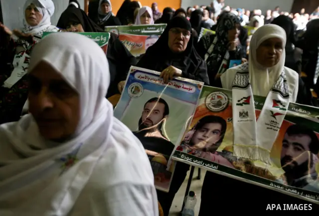 Relatives of Palestinian prisoners held in israeli jails attend a celebration to honor Palestinian journalists by Islamic Jihad movement in Gaza City on 19 May 2012. Photo by Ali Jadallah
