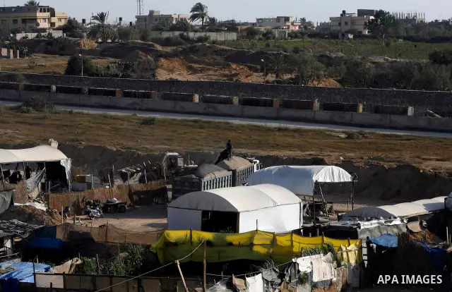 Palestinians transport goods by smuggling tunnels on the border between Egypt and Gaza in the southern Gaza Strip at the Rafah Refugee Camp on May 19, 2012. Living conditions in Gaza have deteriorated because of Israeli...