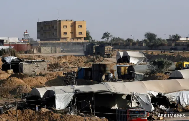 Palestinians transport goods by smuggling tunnels on the border between Egypt and Gaza in the southern Gaza Strip at the Rafah Refugee Camp on May 19, 2012. Living conditions in Gaza have deteriorated because of Israeli...