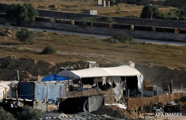 Palestinians transport goods by smuggling tunnels on the border between Egypt and Gaza in the southern Gaza Strip at the Rafah Refugee Camp on May 19, 2012. Living conditions in Gaza have deteriorated because of Israeli...